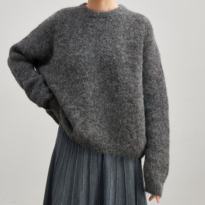 Warm and cozy women's ribbed sweater, a must-have for any fall or winter wardrobe.