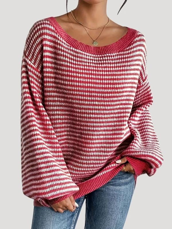 Soft knit women's sweater featuring a chic striped pattern and relaxed silhouette