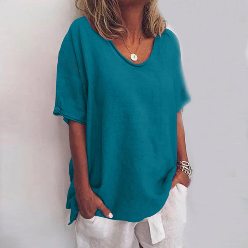 Chic women's V-neck top, relaxed fit, elbow-sleeve blouse. Great for spring and summer casual wear. Effortless style.