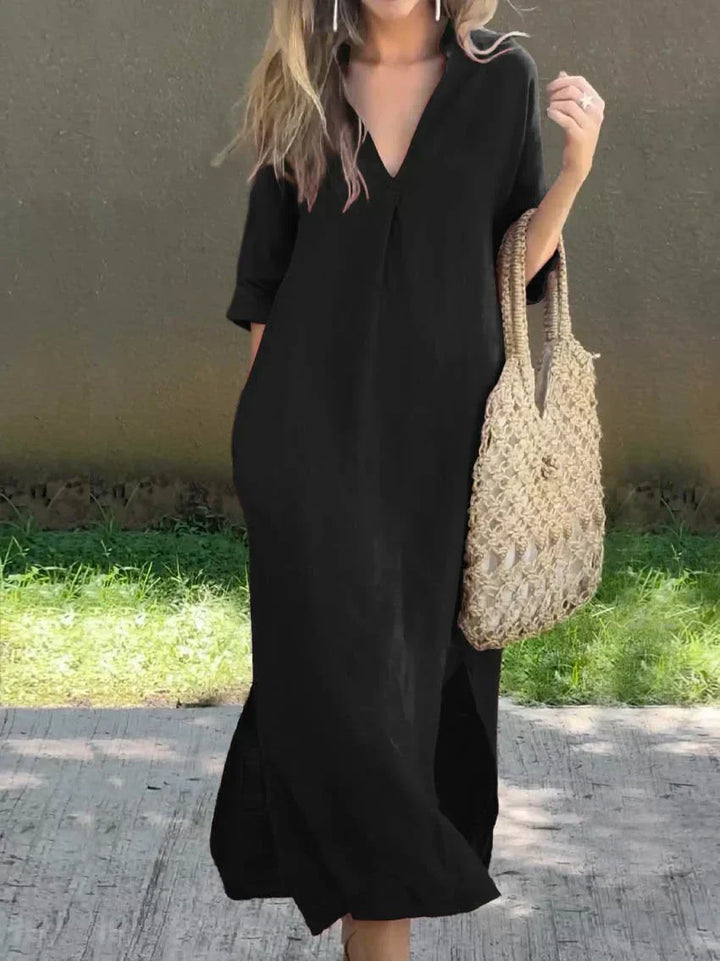 Women's casual V-neck maxi dress with relaxed fit, 3/4 sleeves, & side slits. Great for summer, travel & comfort.