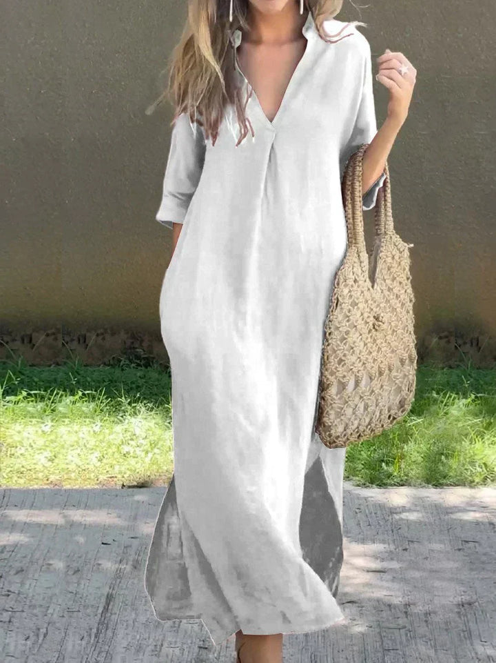 Chic women's V-neck maxi dress, relaxed & flowy. A versatile 3/4 sleeve summer dress for casual elegance.