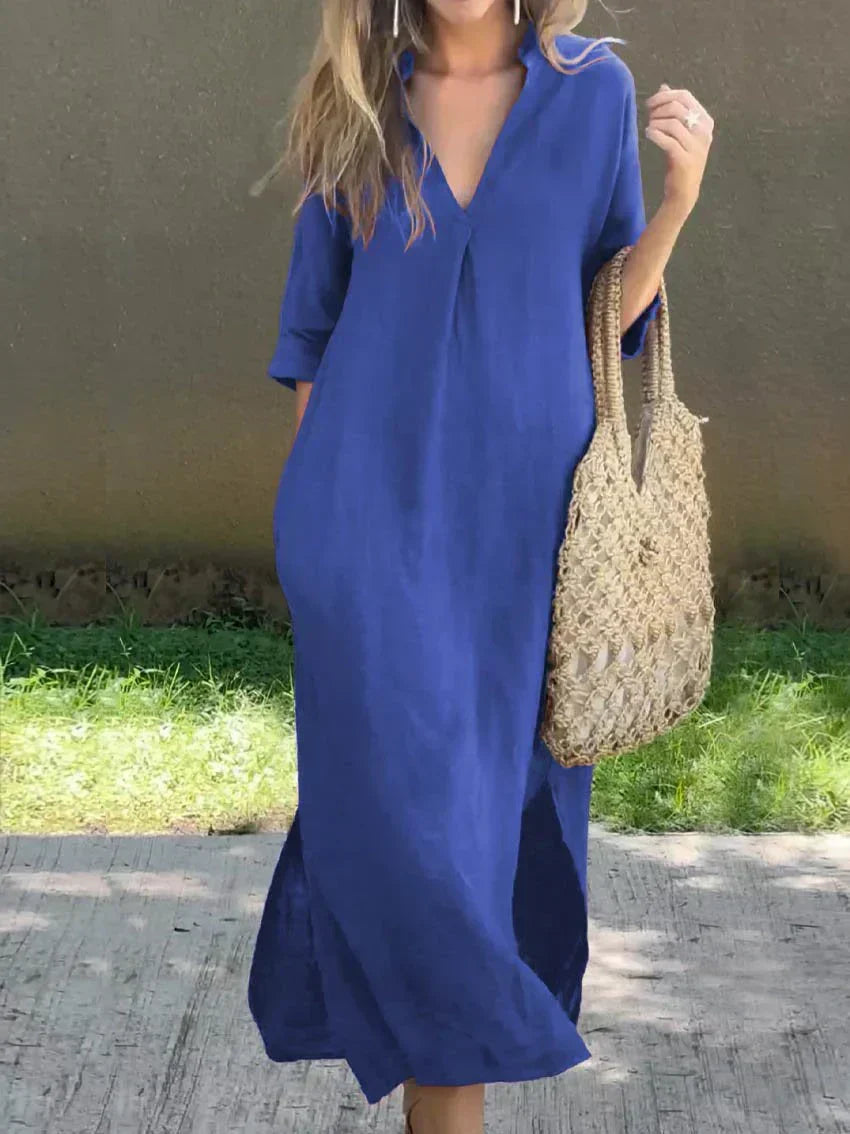 Lightweight women's relaxed V-neck maxi dress, 3/4 sleeves & side slits, perfect for summer vacation comfort.