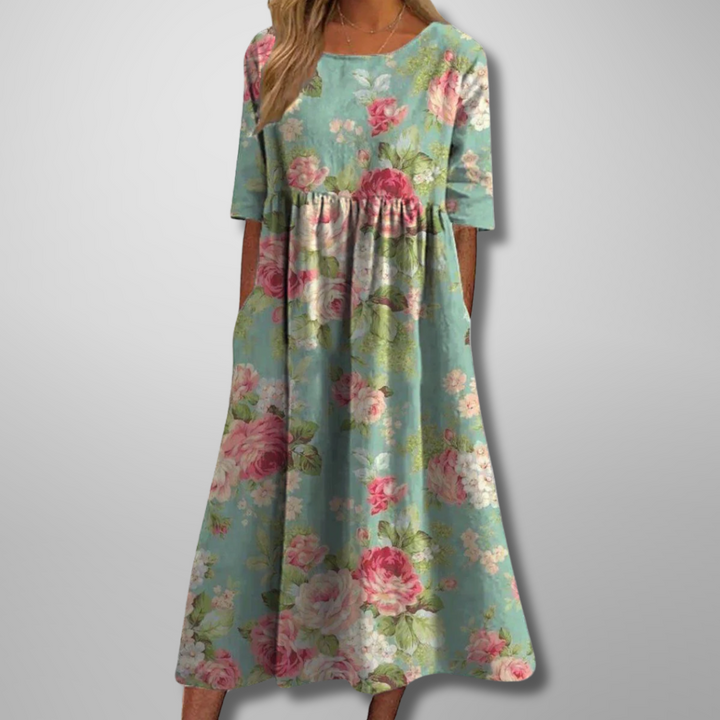 Flowy, relaxed fit women's floral midi dress for comfortable, casual everyday wear.