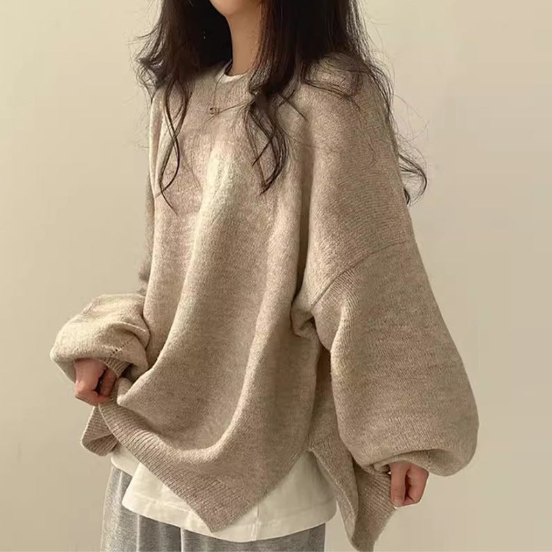 Oversized women's pullover sweater, soft knit fabric with stylish relaxed hem, warm top