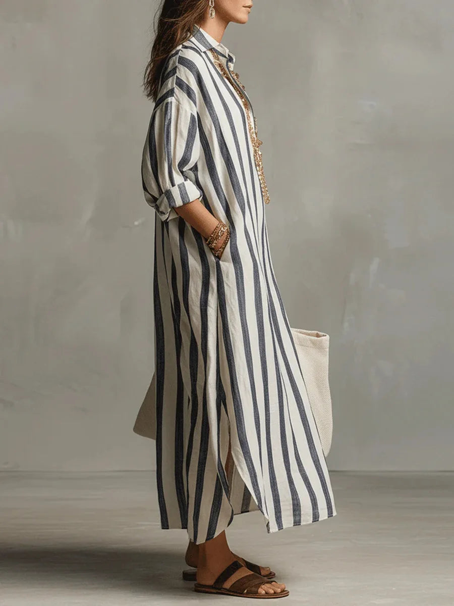 Striped women's long shirt dress. Relaxed fit, V-neck, three-quarter sleeves for stylish summer comfort and casual fashion.