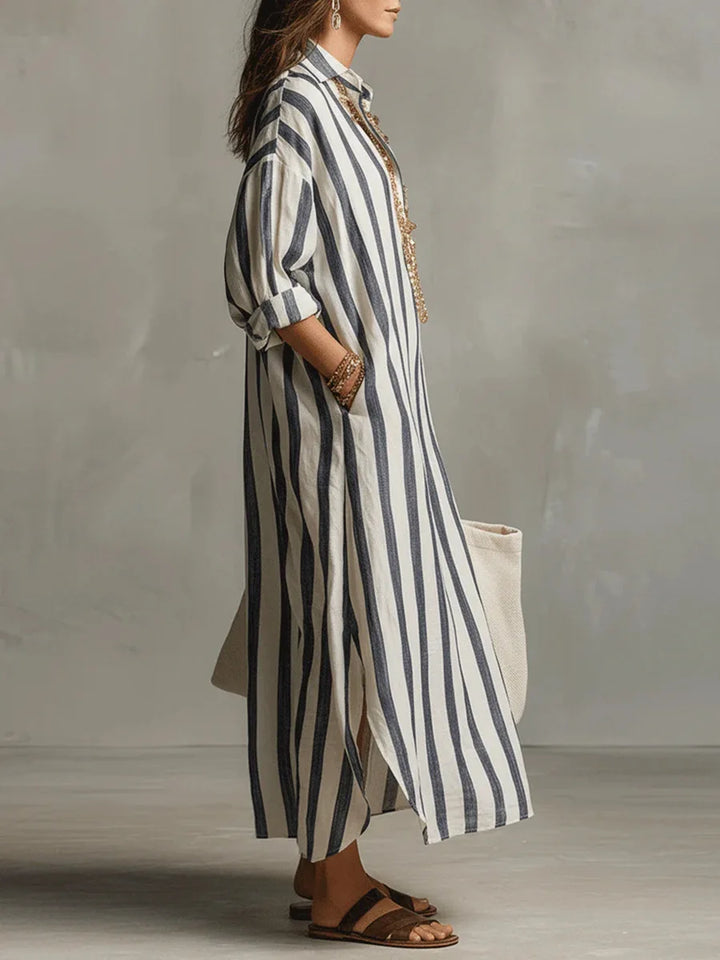 Striped women's long shirt dress. Relaxed fit, V-neck, three-quarter sleeves for stylish summer comfort and casual fashion.