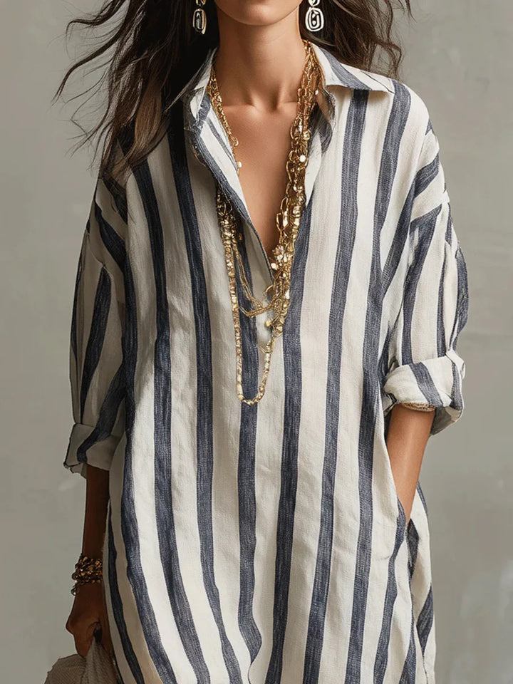 Versatile women's long shirt dress. Relaxed fit, V-neck, three-quarter sleeve, perfect as a beach, day, or casual dress.