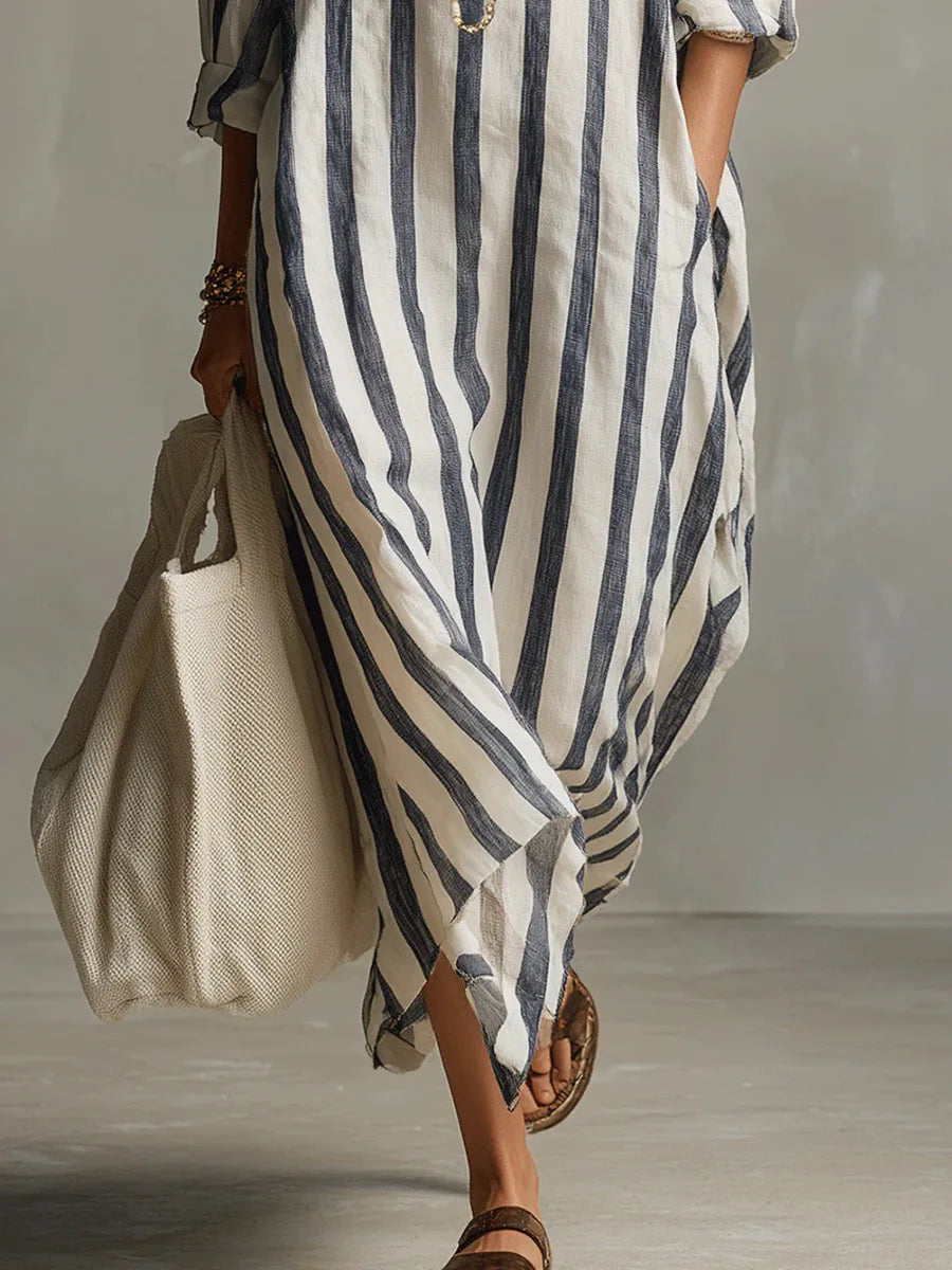 Flowy women's long shirt dress with a relaxed fit. V-neck, three-quarter sleeves for comfortable summer style and fashion.
