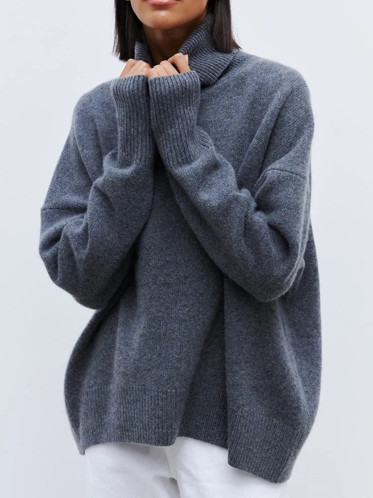 Women's relaxed merino blend turtleneck sweater in cozy knit, perfect for winter fashion and casual wear.
