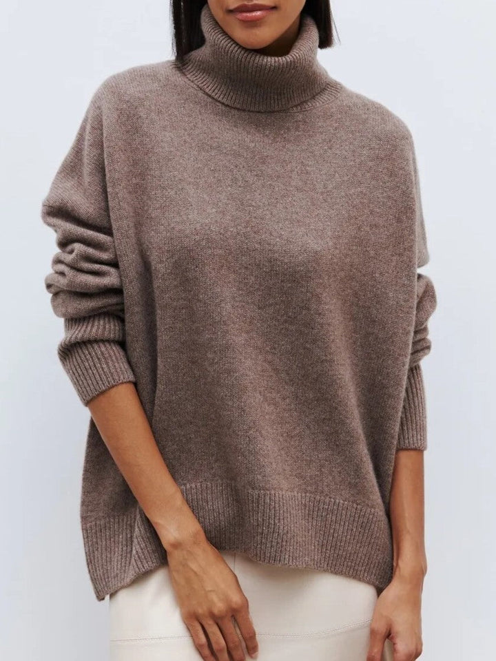 Stylish women's relaxed merino blend turtleneck sweater, perfect for layering during cooler winter days.
