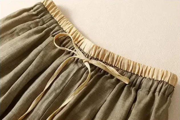 Breathable and comfortable women's pants: Relaxed tapered linen trousers for effortless style.