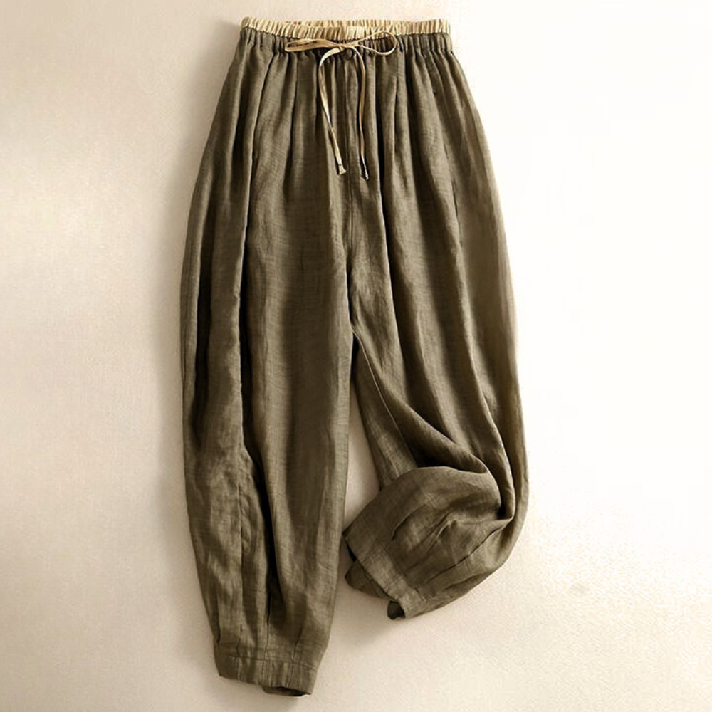 Front view of women's relaxed fit linen trousers, showcasing the tapered leg and breathable fabric.