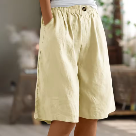Stylish women's relaxed wide leg Bermuda shorts, offering a versatile and comfortable option for summer outfits.