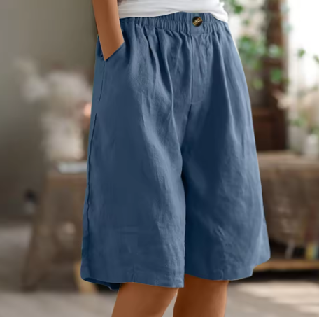 Front view of women's relaxed wide leg Bermuda shorts in a neutral tone, showcasing the knee-length design.