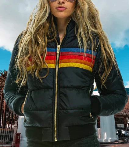 Close-up of a women's retro color block puffer jacket, showcasing its unique pattern and warm fabric