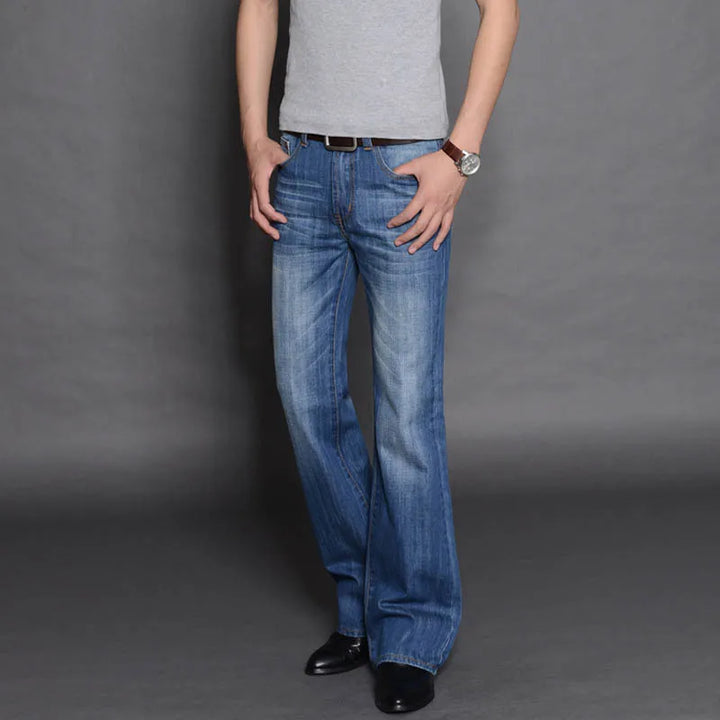 Detail of the flare on women's '70s denim jeans, highlighting the vintage style of bell bottoms