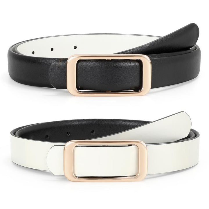 Classic women's fashion accessory: a reversible leather belt with a sleek, polished buckle.