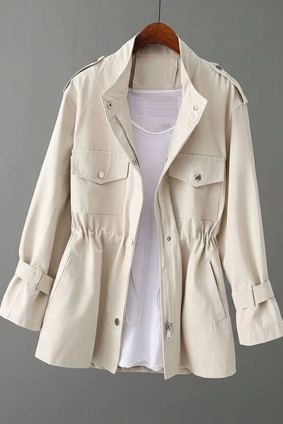 Black women's rugged open back utility jacket. Perfect for versatile layering, modern street style & fashion outerwear.