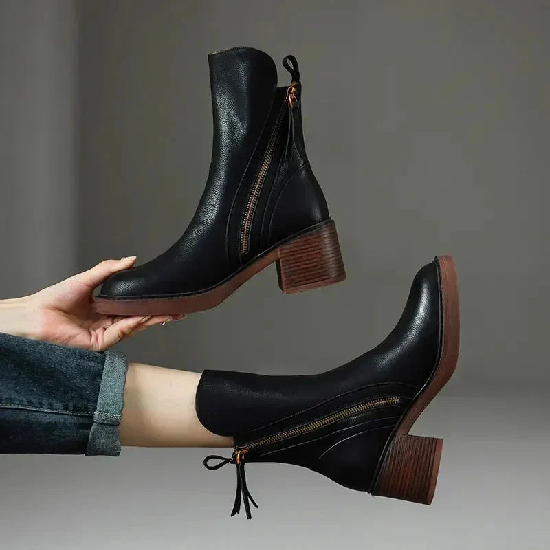 Pair of black leather women's Salerno platform ankle boots, perfect for fall and winter fashion.