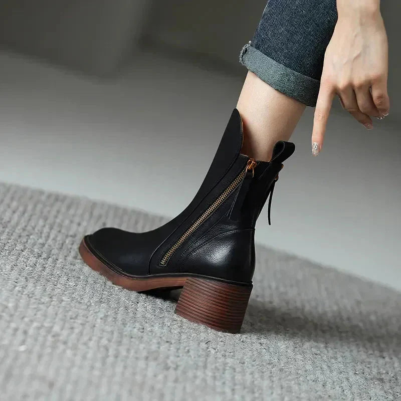 Detail of the side zipper closure on women's Salerno platform ankle boots with a sturdy block heel.