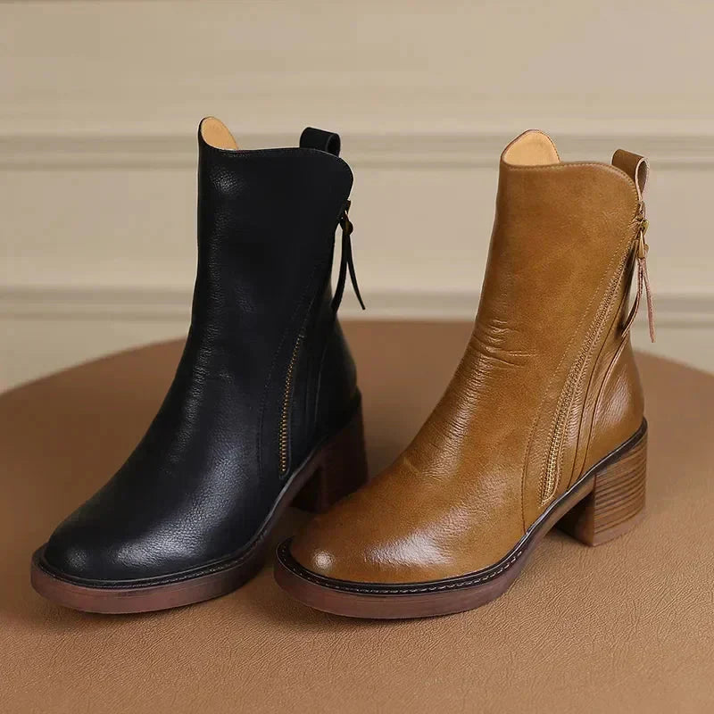 Salerno women's black leather platform ankle boots on a white background, highlighting their versatile style.