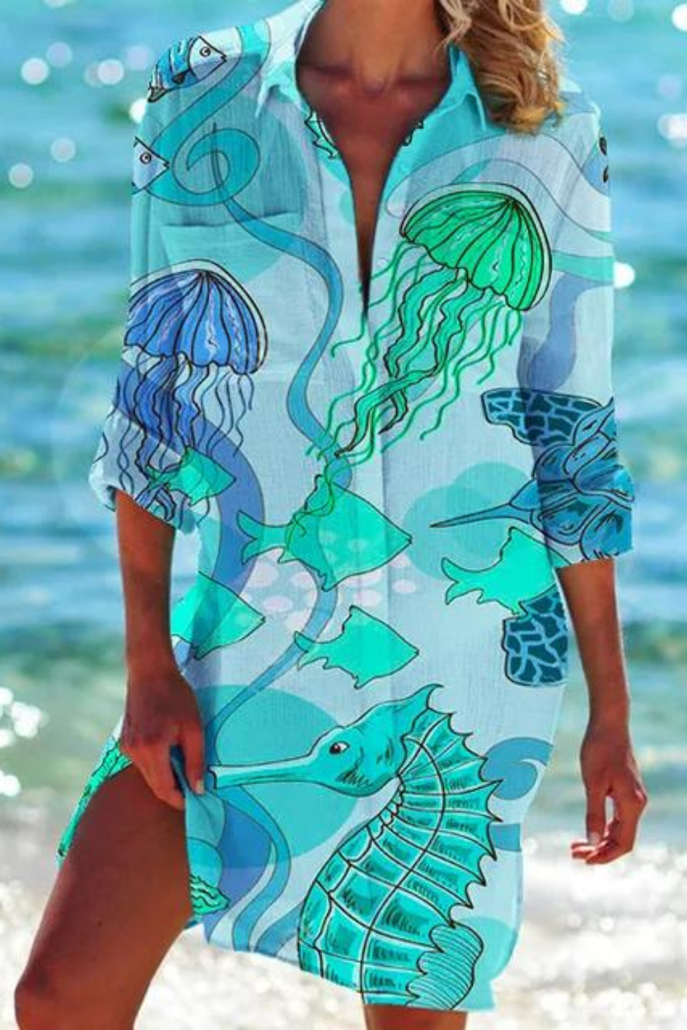 Summer women's button-down beach cover-up with a vibrant seashell coral pattern.