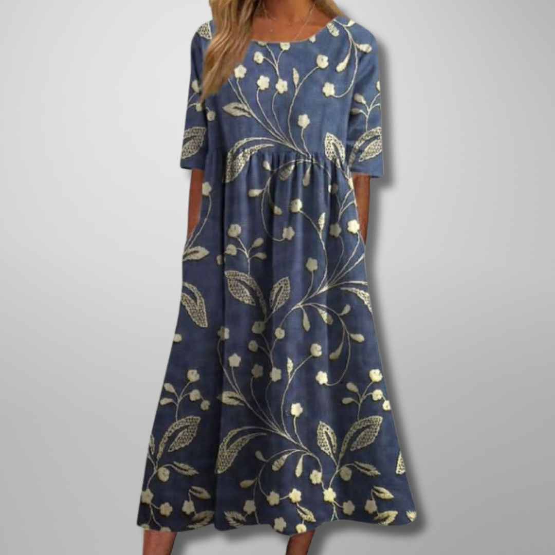 Women's short sleeve loose fit midi dress with botanical print, perfect for casual summer style.