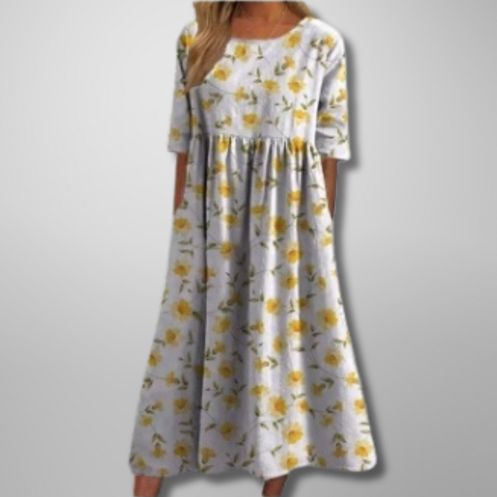 Stylish women's short sleeve botanical print midi dress, offering a relaxed loose fit for ultimate comfort.