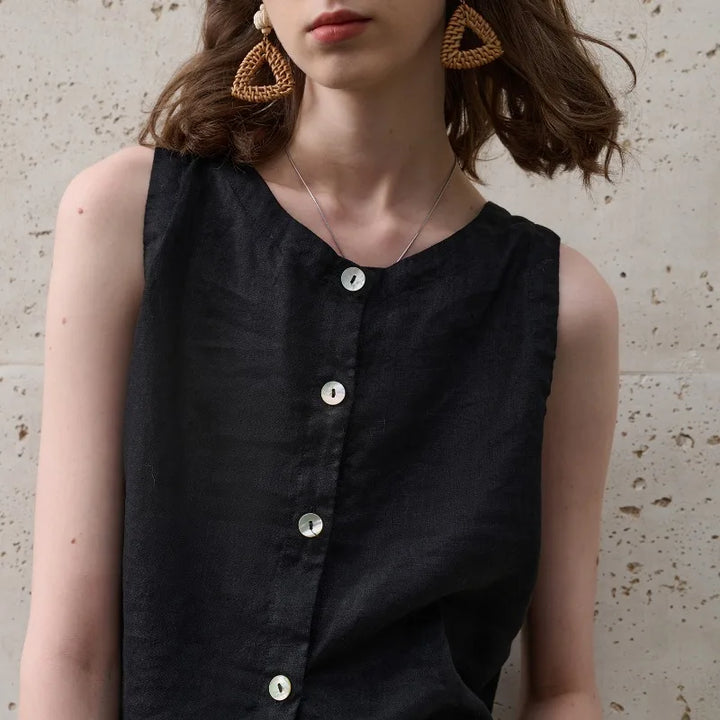 Modern women's sleeveless asymmetric crop top, crew neck. A comfortable piece for casual summer style.