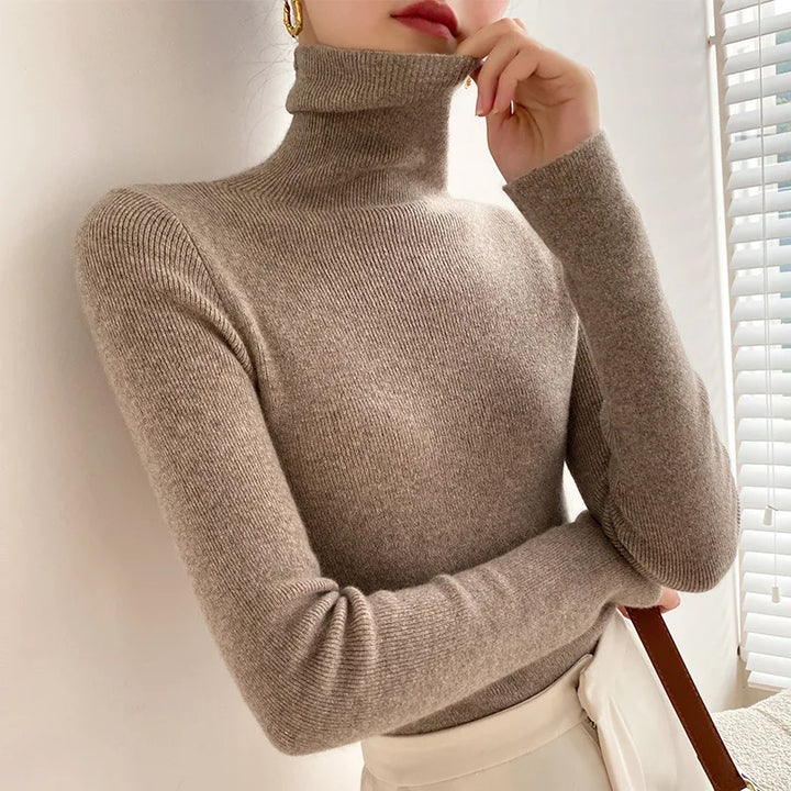 Long sleeve women's slim fit turtleneck sweater, a versatile knitwear piece for fall & winter outfits.
