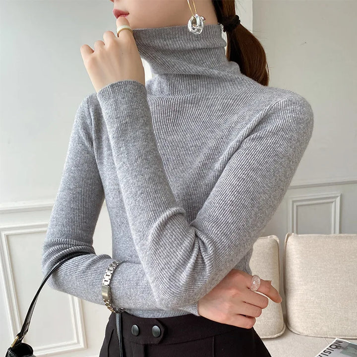 Cozy & elegant women's slim fit turtleneck sweater, perfect for effortless fall fashion and winter layering.
