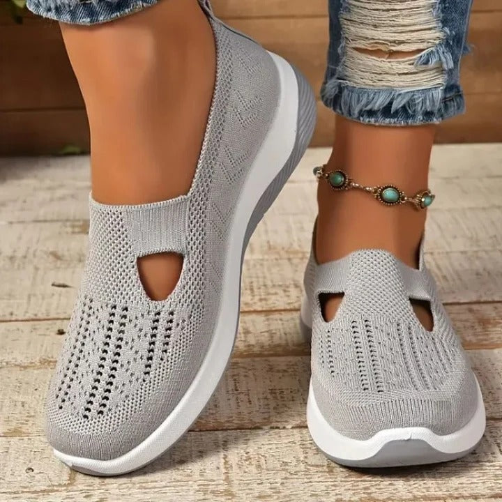 Lightweight women's slip-on sneakers, perfect for walking and casual everyday comfort.