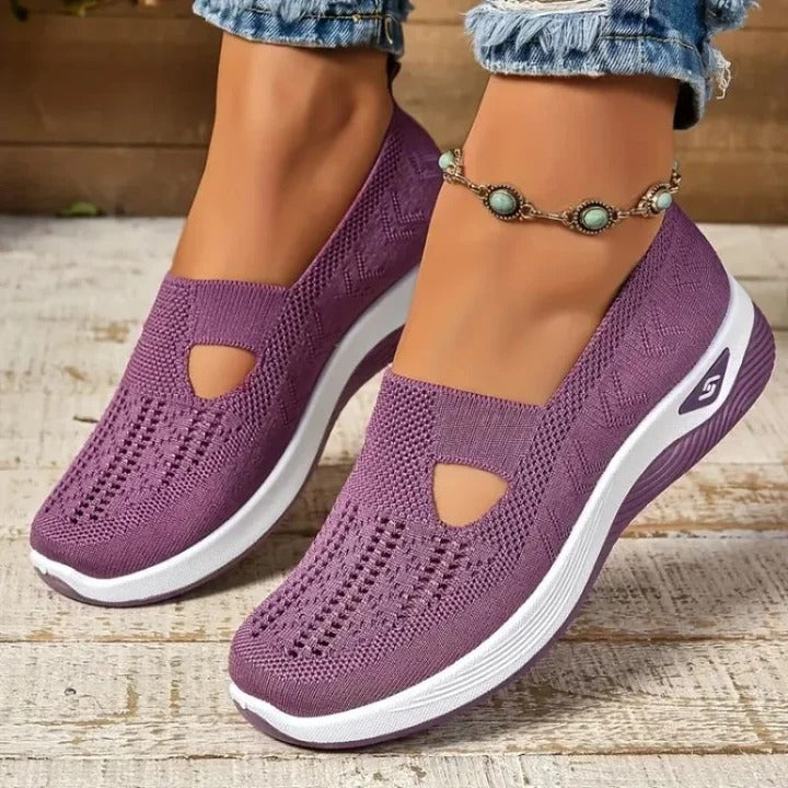 Breathable women's casual slip-on shoes with cushioned arch support, ideal for daily walks.