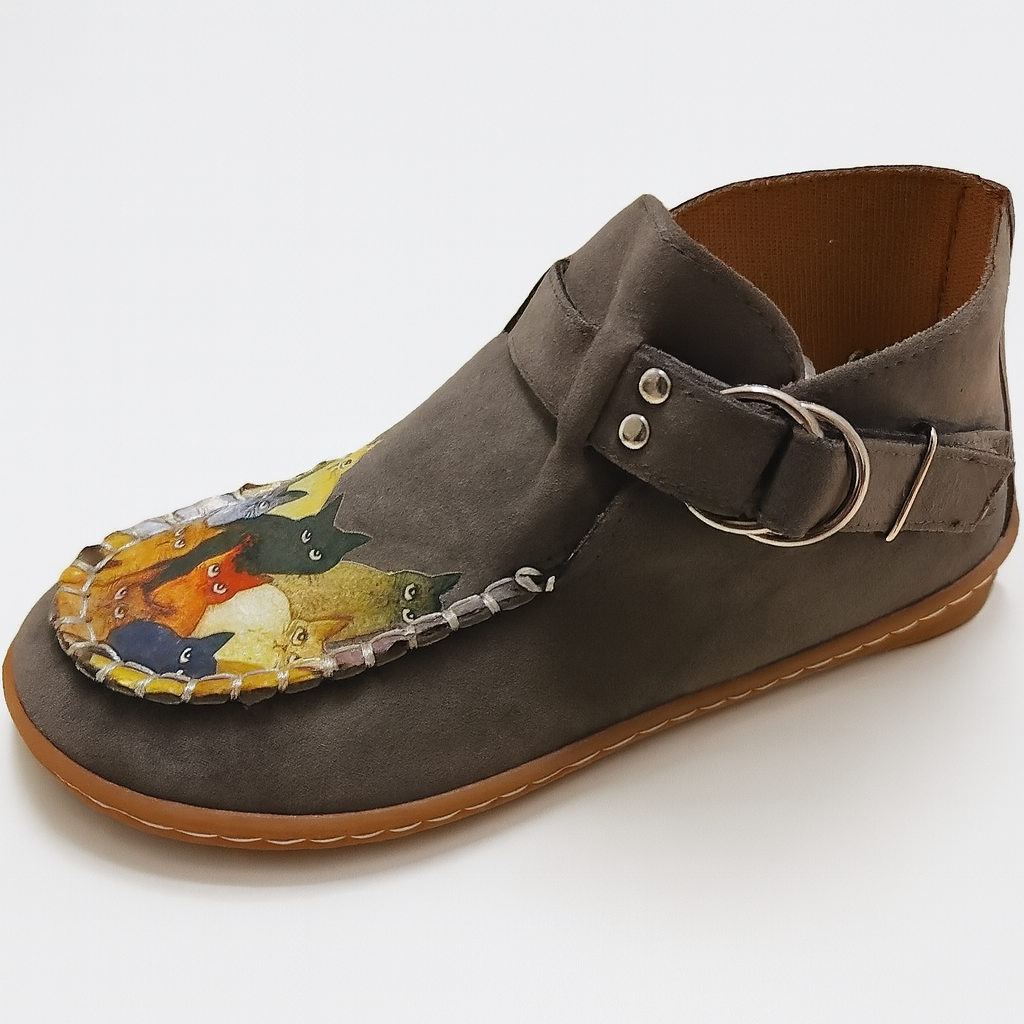 Casual women's footwear: slip-on shoes adorned with an artistic cat design, perfect for unique animal print lovers.