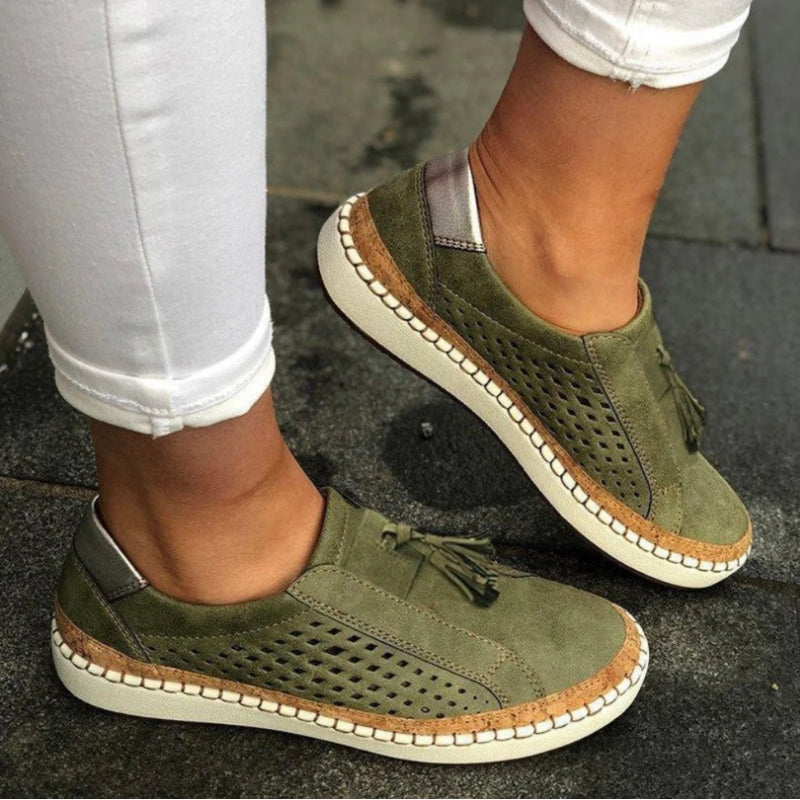 Women's slip-on shoes with orthopedic arch support for comfortable everyday walking & travel. Breathable casual footwear.