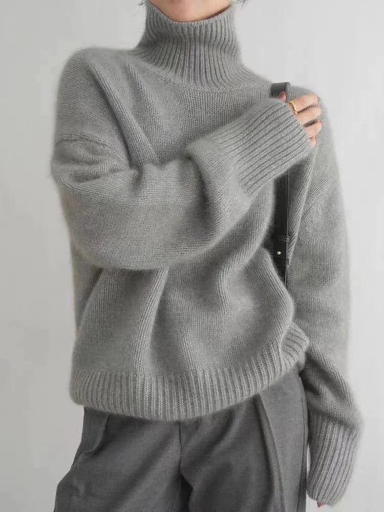 Warm and elegant women's funnel neck sweater made from 100% premium cashmere knitwear