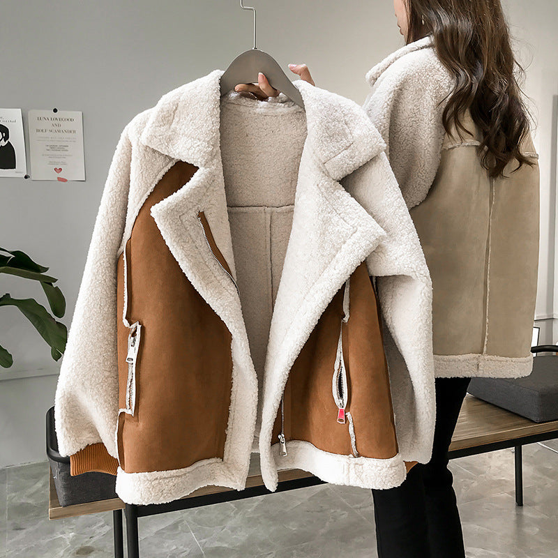 Plush women's oversized faux shearling coat, a warm and casual jacket for cold weather.