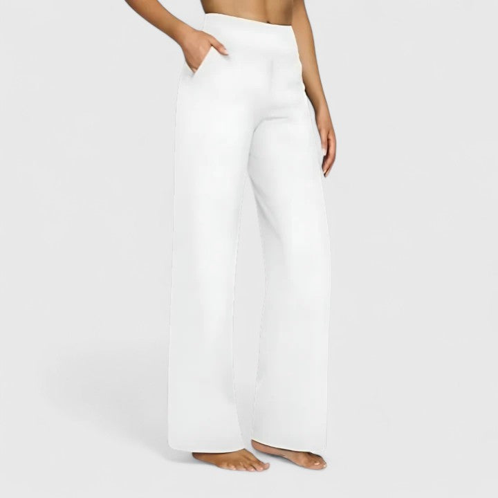 Comfortable women's pull-on dress pants with wide waistband, perfect for work or travel.