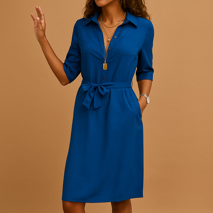 Elegant women's belted shirt dress with button-down front, a versatile and trendy spring outfit.