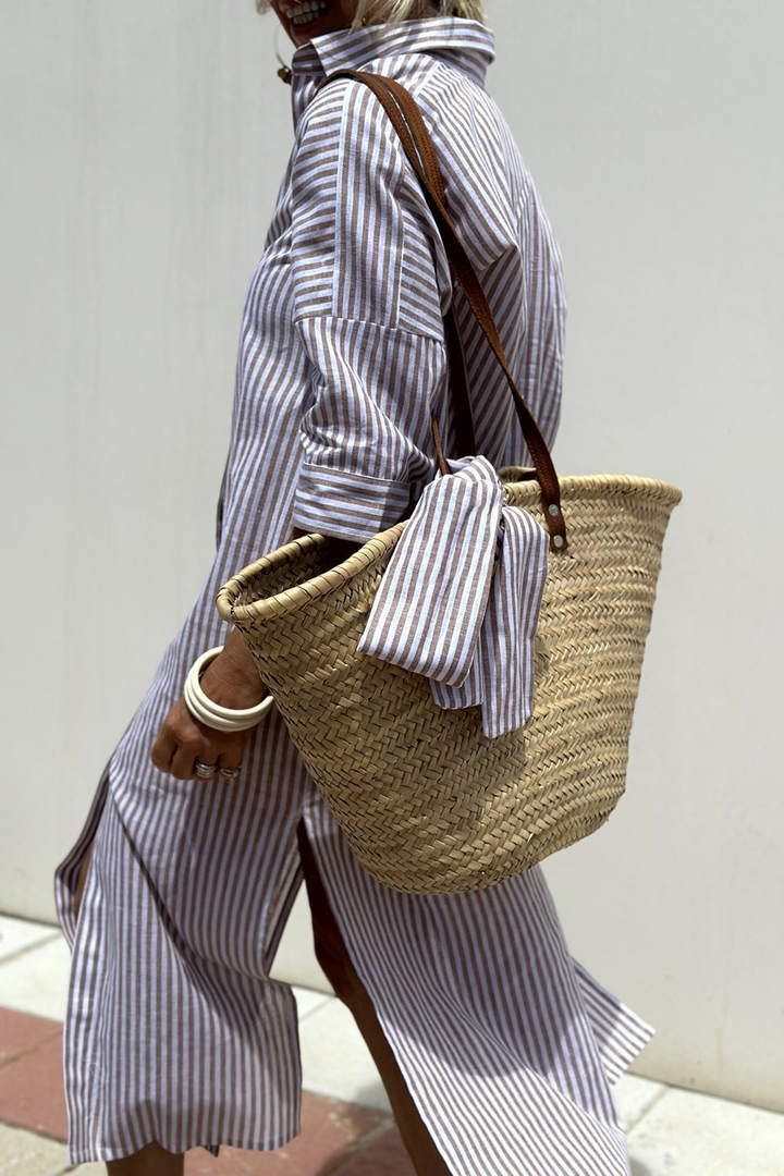 Must-have summer striped midi dress for women, offering a relaxed oversized fit, collared neckline, & button front.