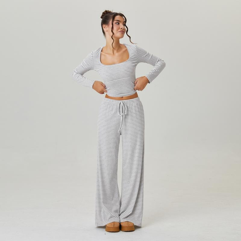 Two-piece women's lounge set featuring a soft striped jersey fabric, square neck top, and wide-leg pants.