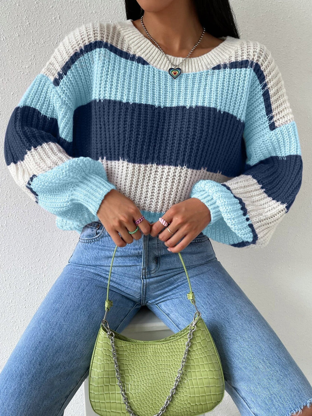 Soft women's striped sweater, ideal for comfortable daily wear and layering