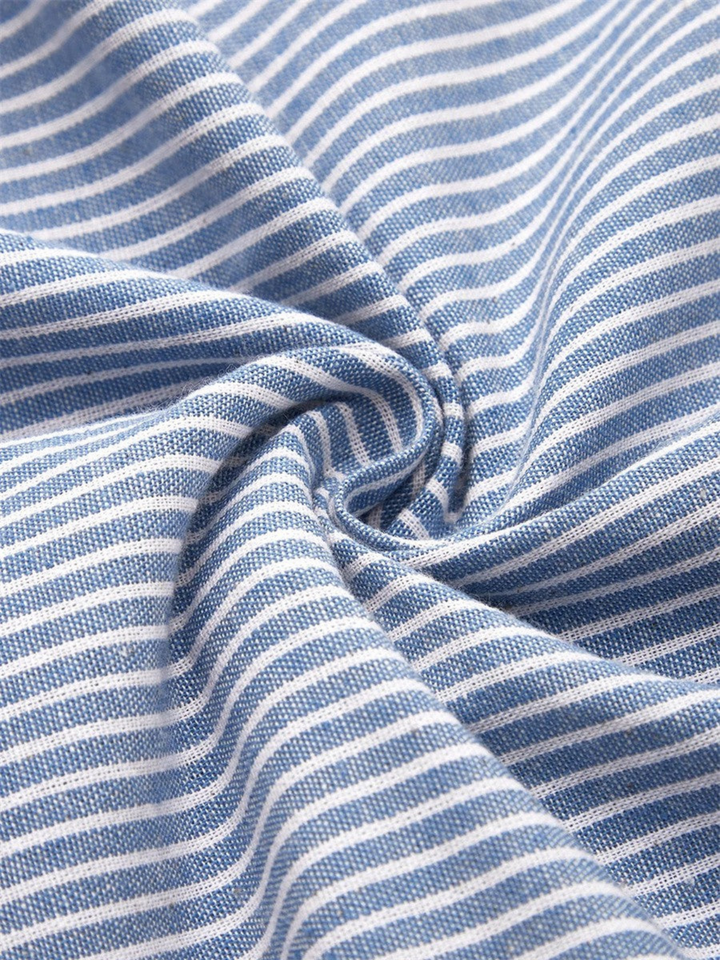 Stylish women's midi dress featuring classic stripes, functional button detail, and practical side pockets.