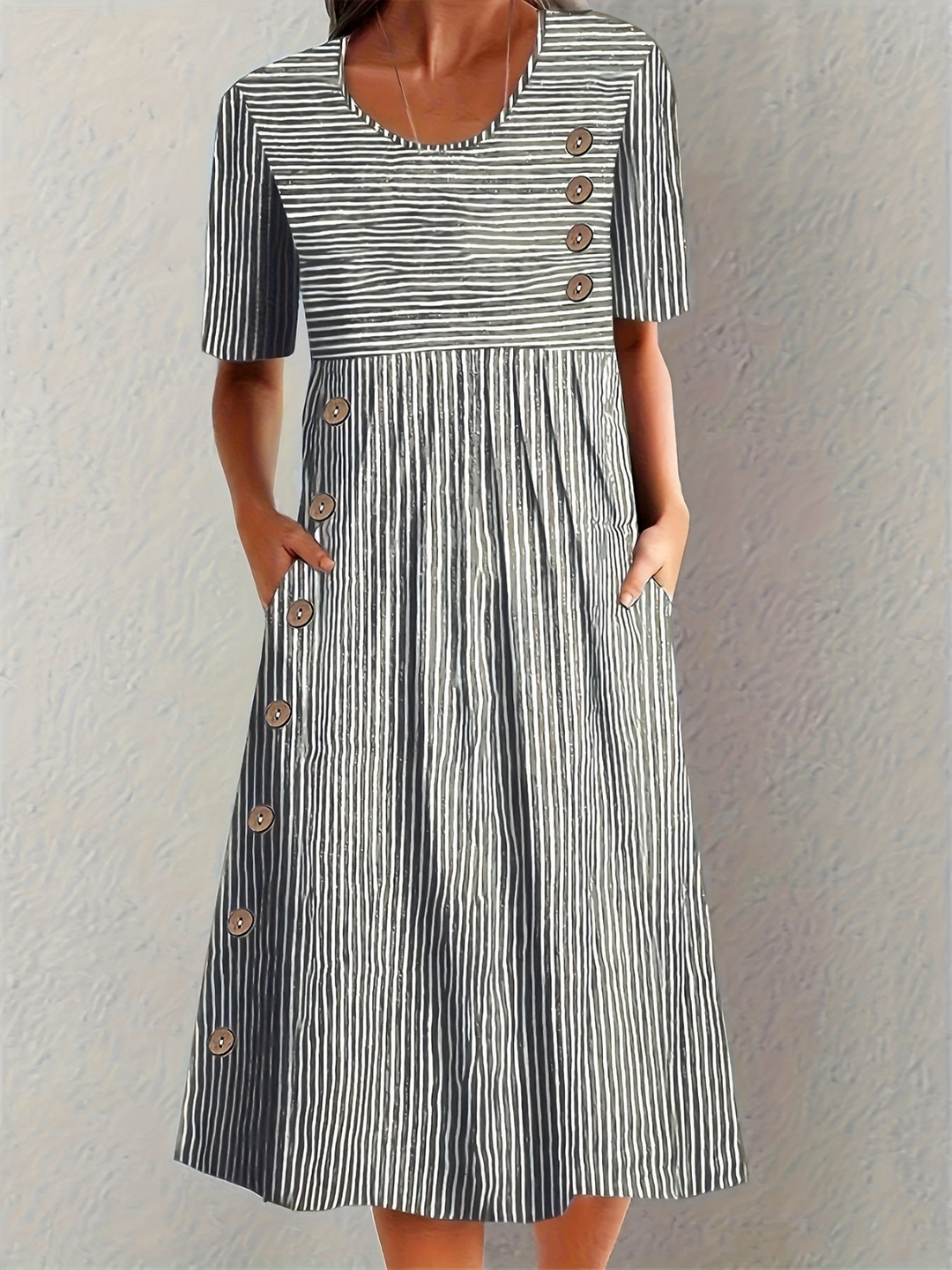 Versatile women's striped midi dress with front buttons & pockets, ideal for a chic summer outfit or casual day wear.