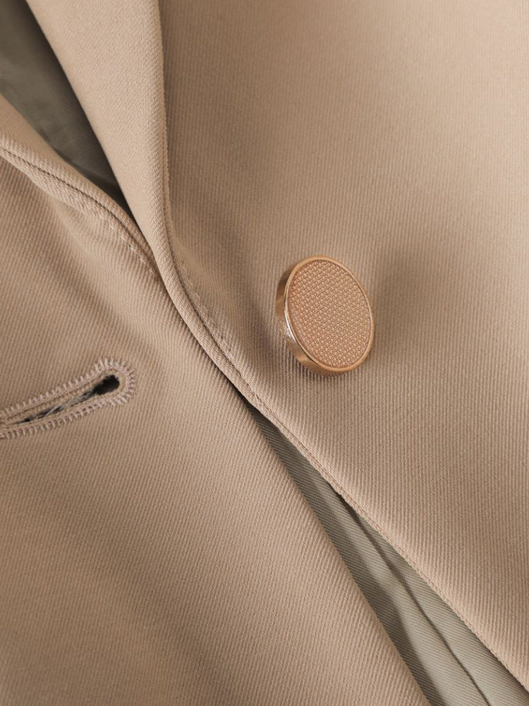 Structured professional women's blazer, a versatile piece for office and formal occasions.