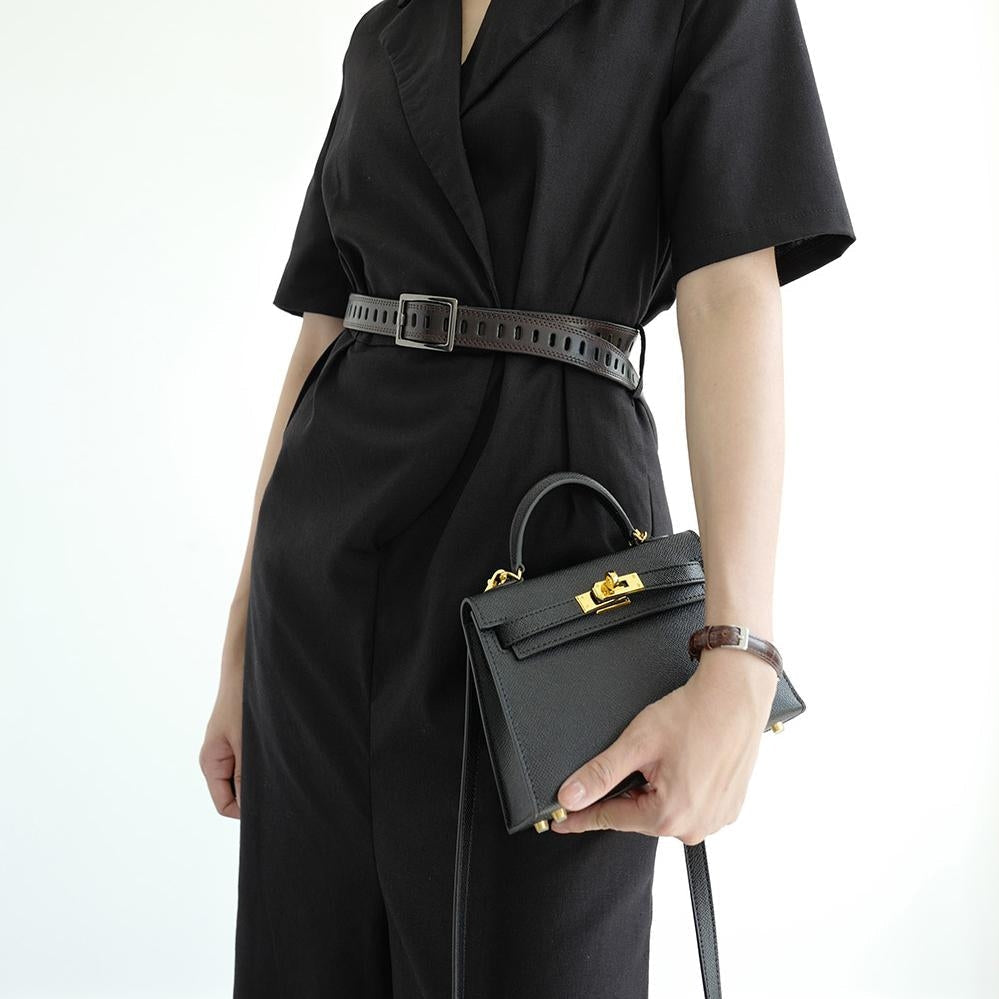 Versatile beige women's top handle & shoulder bag with turn lock detail; perfect crossbody purse.