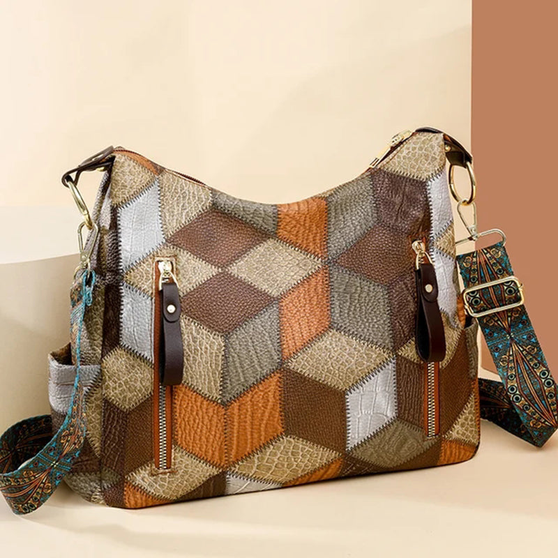 Fashionable women's tote bag with elegant contrast stitching, suitable for work or daily use.
