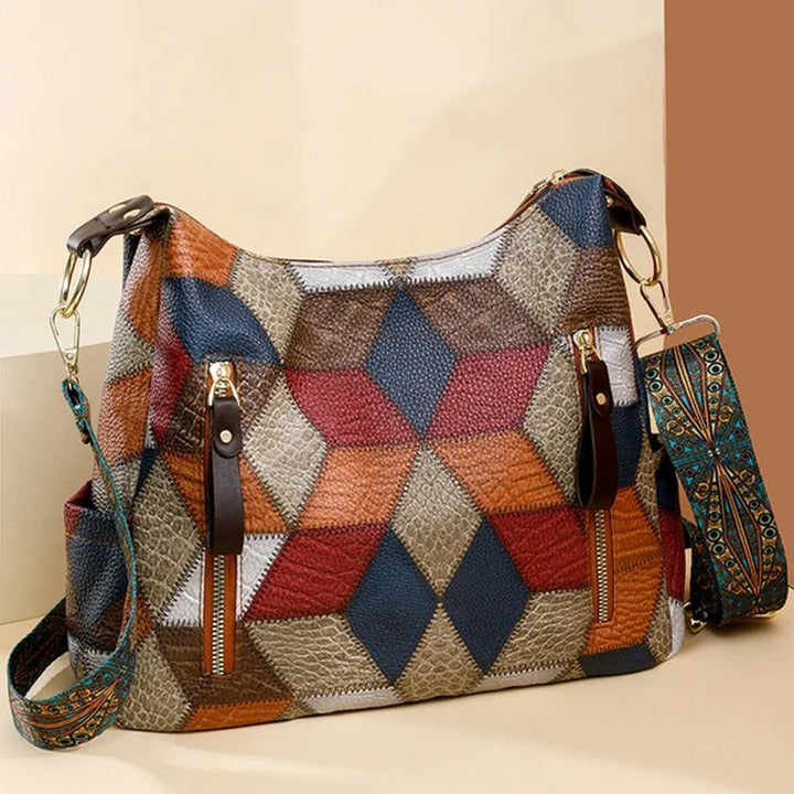 High-quality vegan leather shoulder bag for women, featuring chic contrast stitching and ample room.