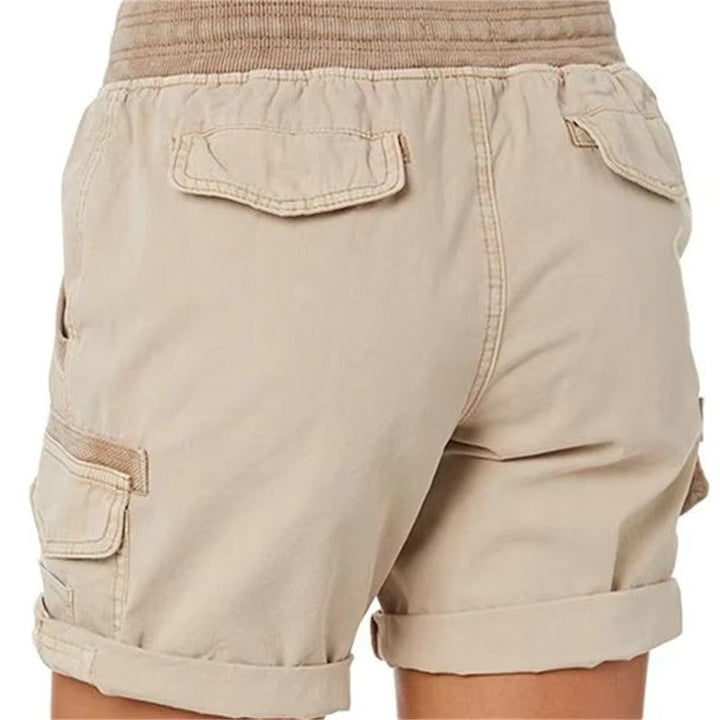 Trendy women's skinny fit summer shorts with a low waist, ideal for stylish beachwear and casual looks.