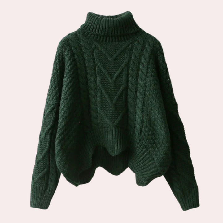 Versatile women's knitted turtleneck sweater. Chic long sleeve top, perfect for layering in winter fashion.